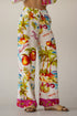White beach pants with tropical pattern LABEL OF LOVE
